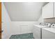 Convenient laundry room with washer, dryer, and storage at 6902 Creekridge Trl, Indianapolis, IN 46256