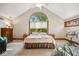 Spacious main bedroom with large windows, vaulted ceilings, and ample closet space at 6902 Creekridge Trl, Indianapolis, IN 46256