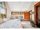 Main bedroom with large windows, vaulted ceilings, and ample closet space at 6902 Creekridge Trl, Indianapolis, IN 46256