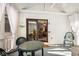 Cozy screened porch with seating area and access to the interior of the house at 6902 Creekridge Trl, Indianapolis, IN 46256