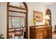 Bright sunroom with seating area and wood accents at 6902 Creekridge Trl, Indianapolis, IN 46256