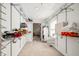 Large walk-in closet with custom shelving and hanging rods at 6902 Creekridge Trl, Indianapolis, IN 46256