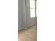 Bedroom with mirrored closet doors and a window at 2021 N Graham Ave, Indianapolis, IN 46218