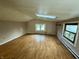 Spacious bonus room with skylight and wood flooring at 8353 N Sr 109, Wilkinson, IN 46186