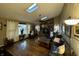 Living room with stone fireplace and hardwood floors at 8353 N Sr 109, Wilkinson, IN 46186