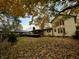 Large backyard with mature trees and autumn leaves at 8353 N Sr 109, Wilkinson, IN 46186