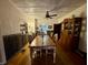 Formal dining room with hardwood floors, wood table, and built-in hutch at 8353 N Sr 109, Wilkinson, IN 46186