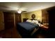 Spacious main bedroom with dark wood floors and a ceiling fan at 8353 N Sr 109, Wilkinson, IN 46186