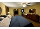Large main bedroom with dark wood floors, a king-size bed, and ample closet space at 8353 N Sr 109, Wilkinson, IN 46186