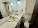Clean bathroom with double vanity and updated toilet at 8353 N Sr 109, Wilkinson, IN 46186