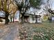 Quaint farmhouse nestled on a spacious lot with mature trees at 8353 N Sr 109, Wilkinson, IN 46186