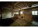 Empty barn stalls with wooden walls and metal gates at 8353 N Sr 109, Wilkinson, IN 46186