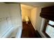 Small bathroom with shower and hardwood floor at 8353 N Sr 109, Wilkinson, IN 46186