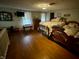 Upstairs bedroom with a queen bed and hardwood floors at 8353 N Sr 109, Wilkinson, IN 46186
