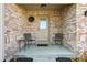 Inviting front porch with brick facade and seating at 3784 Mansfield Dr, Brownsburg, IN 46112