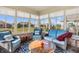 Sunroom with wicker furniture and views of the backyard at 3784 Mansfield Dr, Brownsburg, IN 46112