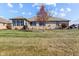 Brick home with a sunroom and large backyard at 3784 Mansfield Dr, Brownsburg, IN 46112
