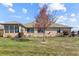 Brick home with a sunroom and large backyard at 3784 Mansfield Dr, Brownsburg, IN 46112