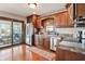 Kitchen with stainless steel appliances and access to a sunroom at 3784 Mansfield Dr, Brownsburg, IN 46112