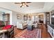 Spacious living room with hardwood floors, fireplace and seating area at 3784 Mansfield Dr, Brownsburg, IN 46112