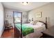 Cozy bedroom with hardwood floors and a charming wooden bed frame at 3784 Mansfield Dr, Brownsburg, IN 46112