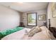 Comfortable bedroom with hardwood floors and a charming wooden bed frame at 3784 Mansfield Dr, Brownsburg, IN 46112