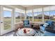 Sunroom with wicker furniture and views of the backyard at 3784 Mansfield Dr, Brownsburg, IN 46112