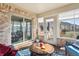 Sunroom with brick walls and sliding glass doors at 3784 Mansfield Dr, Brownsburg, IN 46112
