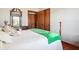 Serene bedroom with hardwood floors and a comfortable queen-size bed at 3784 Mansfield Dr, Brownsburg, IN 46112