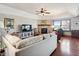 Spacious living room with hardwood floors, fireplace and large windows at 3784 Mansfield Dr, Brownsburg, IN 46112