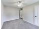 Light-filled bedroom with gray carpet and access to bathroom at 534 Austrian Way, Avon, IN 46123