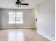 Living room featuring hardwood floors and large windows at 534 Austrian Way, Avon, IN 46123