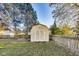 Well-maintained storage shed in a fenced backyard at 534 Austrian Way, Avon, IN 46123
