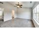 Spacious bedroom with neutral carpeting and ceiling fan at 534 Austrian Way, Avon, IN 46123