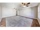 Large bonus room with hardwood floors and ceiling fans at 534 Austrian Way, Avon, IN 46123