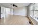 Spacious bedroom with light laminate flooring and ceiling fan at 534 Austrian Way, Avon, IN 46123