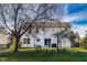 House with backyard, featuring a large tree and patio at 534 Austrian Way, Avon, IN 46123