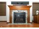 Gas fireplace with granite surround in living room at 3723 Mansfield Dr, Brownsburg, IN 46112