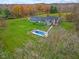 House with inground pool; autumn foliage at 5911 N 400 W, Bargersville, IN 46106