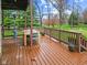 Relaxing deck features a dining area and overlooks a private backyard at 5911 N 400 W, Bargersville, IN 46106