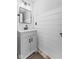 Modern bathroom with a gray vanity, shiplap walls, and black fixtures at 5911 N 400 W, Bargersville, IN 46106