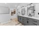 Modern bathroom with double vanity, gray cabinets, and a large walk-in shower at 5911 N 400 W, Bargersville, IN 46106