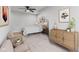 Cozy bedroom with a queen-size bed and stylish dresser at 5911 N 400 W, Bargersville, IN 46106