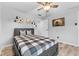 Bedroom with a bed, wall art, and ceiling fan at 5911 N 400 W, Bargersville, IN 46106