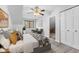 Bright bedroom with cozy seating area and large bed at 5911 N 400 W, Bargersville, IN 46106