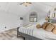 Bright bedroom with vaulted ceilings, a comfortable bed, and plenty of natural light at 5911 N 400 W, Bargersville, IN 46106