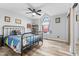 Charming bedroom with a metal bed frame and fun decor at 5911 N 400 W, Bargersville, IN 46106