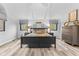 Spacious bedroom with vaulted ceilings, large windows, and a modern dresser at 5911 N 400 W, Bargersville, IN 46106
