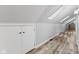 Spacious hallway with skylights and wood-look flooring at 5911 N 400 W, Bargersville, IN 46106