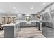 Modern gray kitchen with white subway tile backsplash and stainless steel appliances at 5911 N 400 W, Bargersville, IN 46106